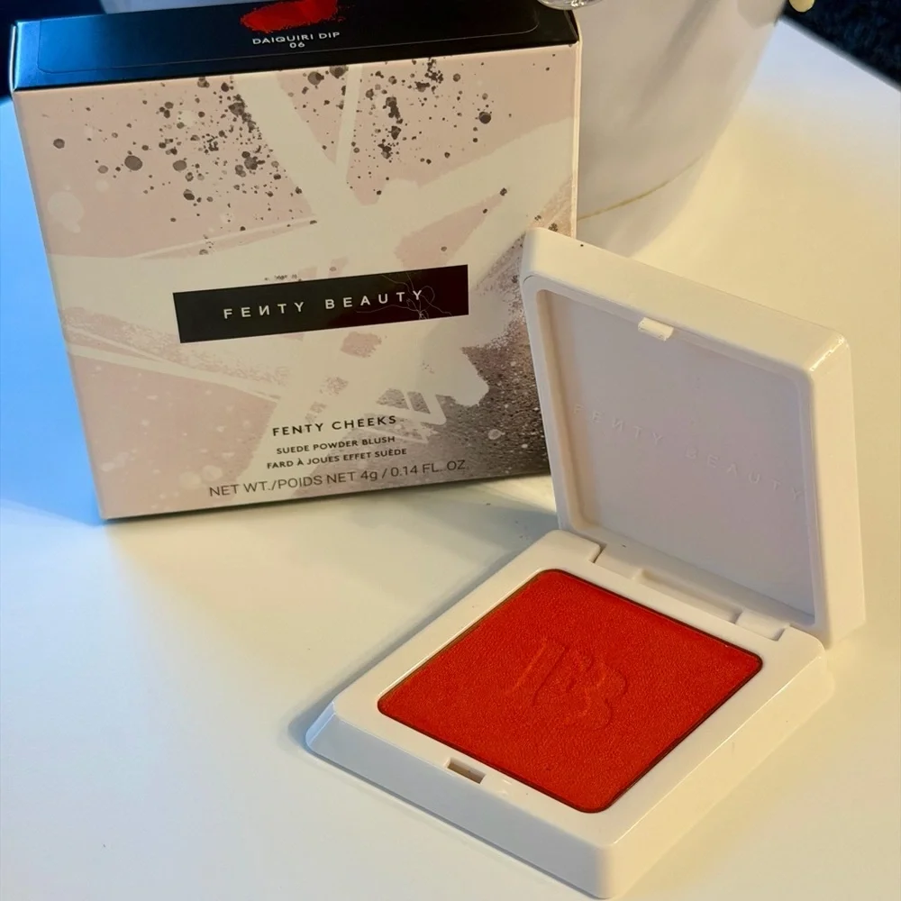 FENTY BEAUTY Fenty Cheeks Suede Powder Blush in Daiquiri Dip (Coral Red)